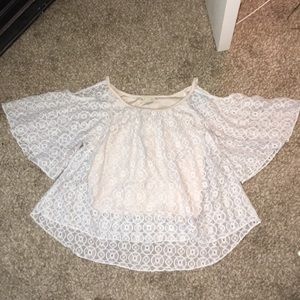 It’s on time open shoulder shirt